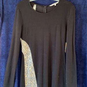 Black form fitting dress, Snake skin